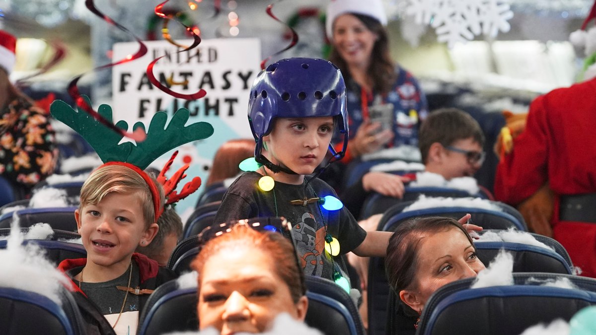 Kids fly to see Santa at North Pole transformed Denver airport hangar – NBC Chicago