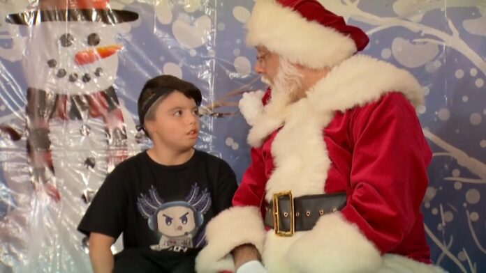 Santa Claus uses sign language to communicate with Aurora kids – NBC Chicago